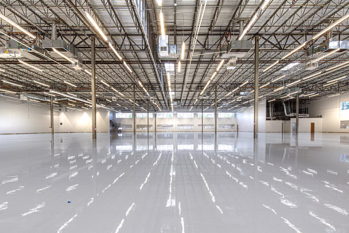 Commercial epoxy flooring installed in a warehouse in Lehi, Utah County