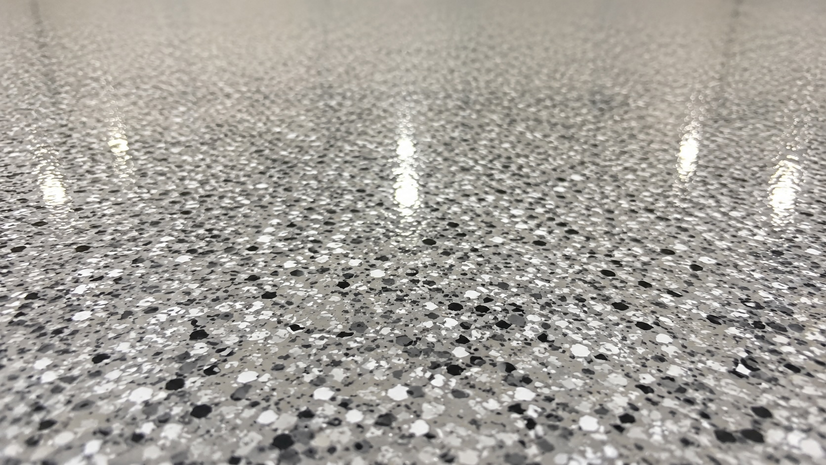 Gray epoxy floor coating with flake chip system in a Lehi Utah garage